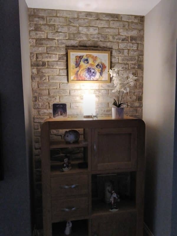 Iced Grey Feature Wall behind a cabinet